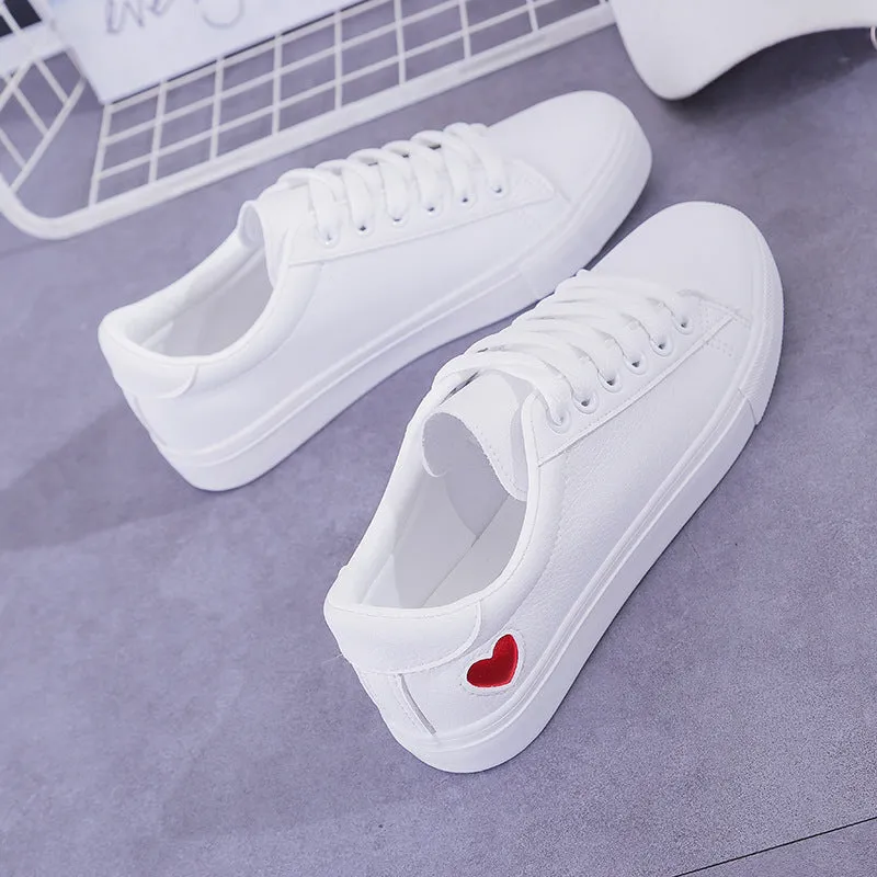 Women's PU leather heart flats shoes with colourful beads and stainless steel pendant on white background