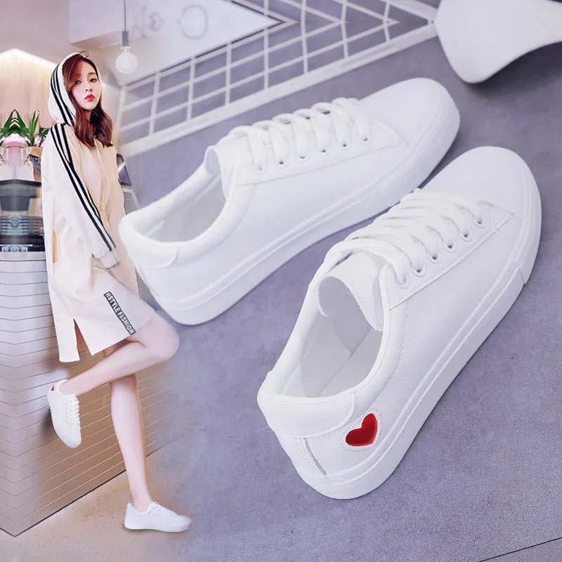 Women's PU leather heart flats shoes with colourful beads and stainless steel pendant on white background