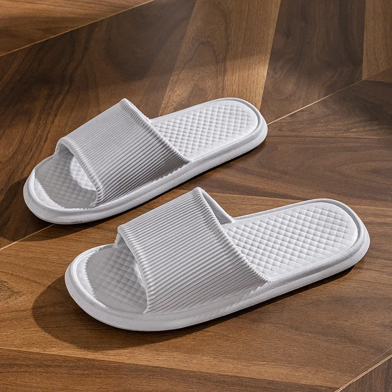 Pair of solid colour rhombus striped non-slip EVA foam indoor slippers