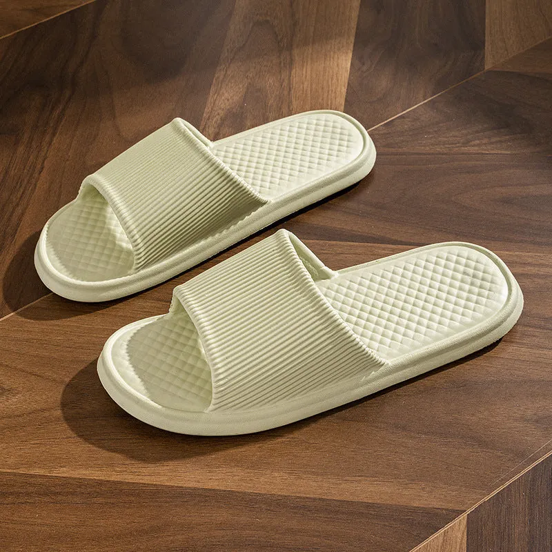 Pair of solid colour rhombus striped non-slip EVA foam indoor slippers