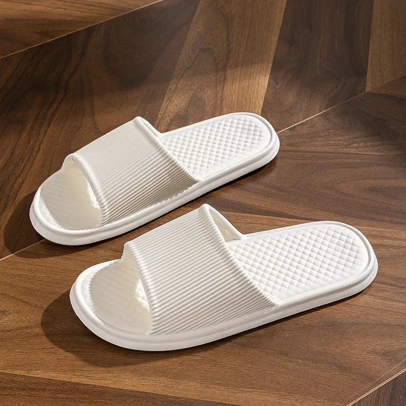 Pair of solid colour rhombus striped non-slip EVA foam indoor slippers