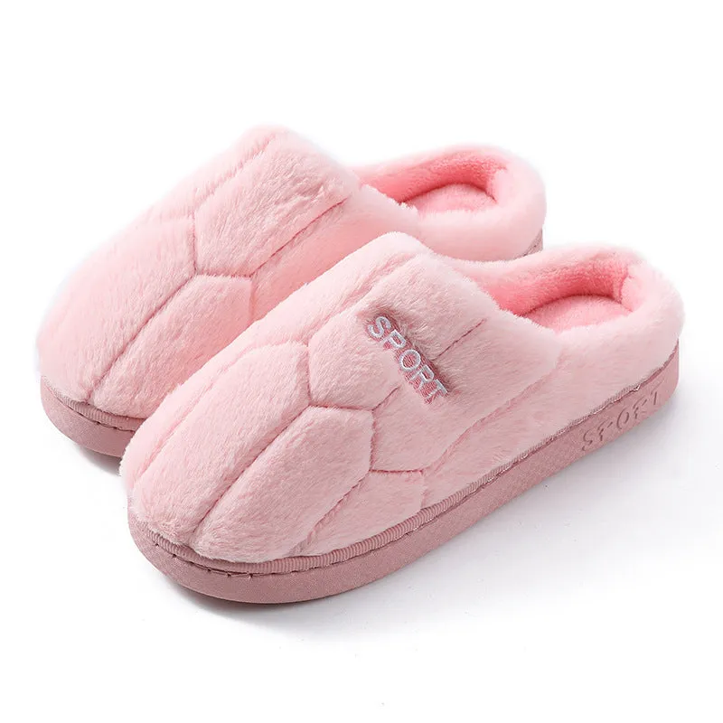 Unisex plush house slippers with white honeycomb-patterned PVC sole, showing round toe and plush inner lining in purple colour