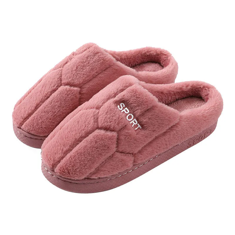 Unisex plush house slippers with white honeycomb-patterned PVC sole, showing round toe and plush inner lining in purple colour