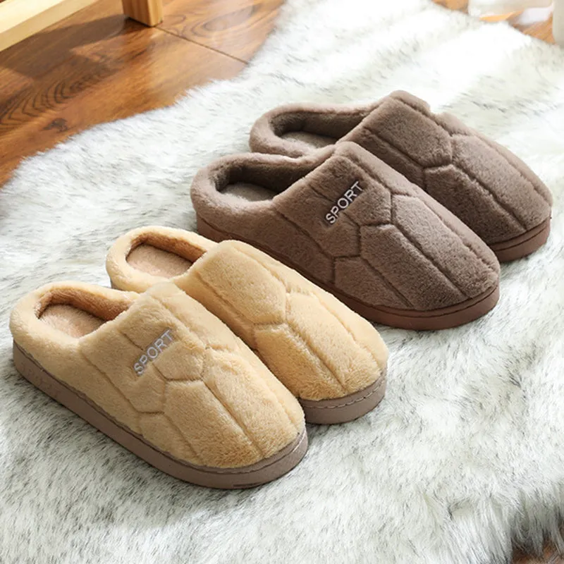 Unisex plush house slippers with white honeycomb-patterned PVC sole, showing round toe and plush inner lining in purple colour