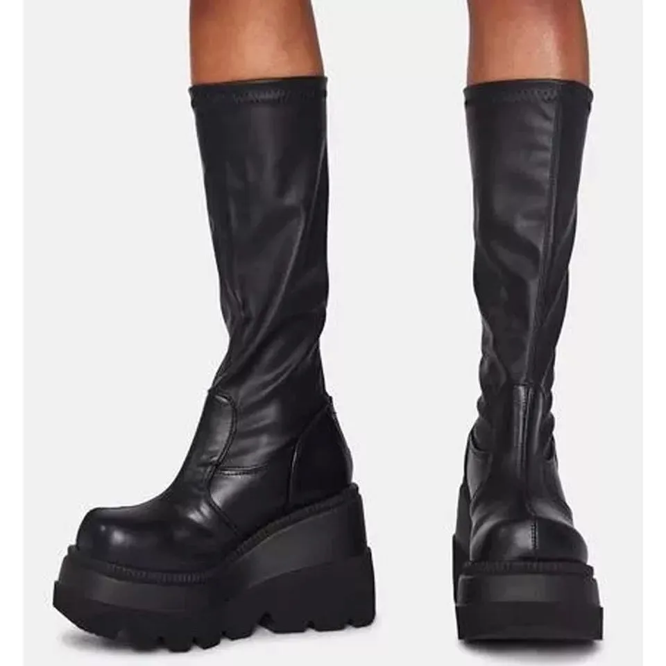 Women winter platform boots in black with front tie lace-up and genuine leather upper