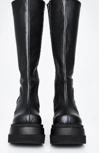 Women winter platform boots in black with front tie lace-up and genuine leather upper