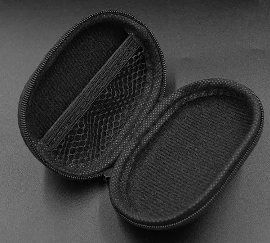 Black soft leather oval-shaped earphone storage bag.