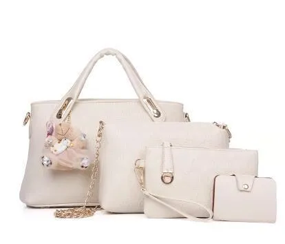 New Korean fashion embossed PU four-piece ladies bag set with three bags in black, blue, and pink