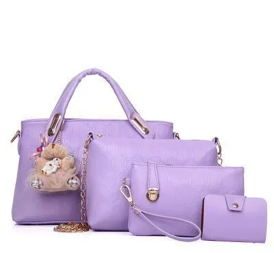 New Korean fashion embossed PU four-piece ladies bag set with three bags in black, blue, and pink