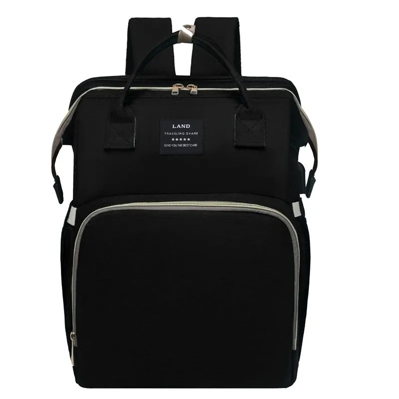 Multifunctional maternity diaper backpack with removable foldable crib in green Oxford fabric