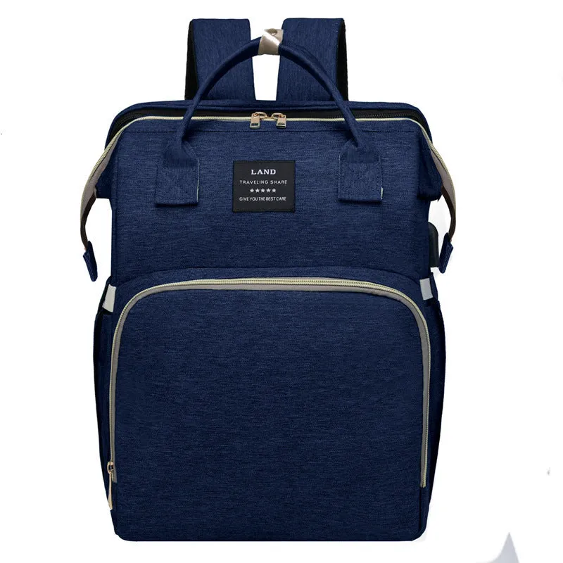 Multifunctional maternity diaper backpack with removable foldable crib in green Oxford fabric