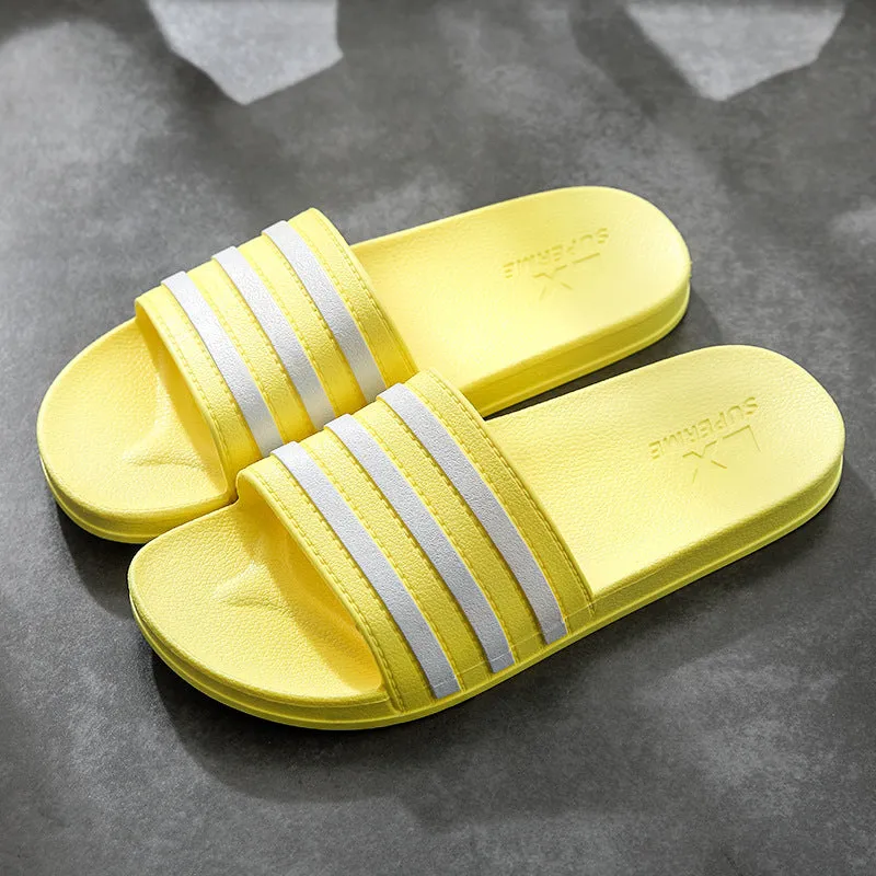 White stripes PVC bathroom slippers for women and men with three-bar stripe design and injection moulded sole