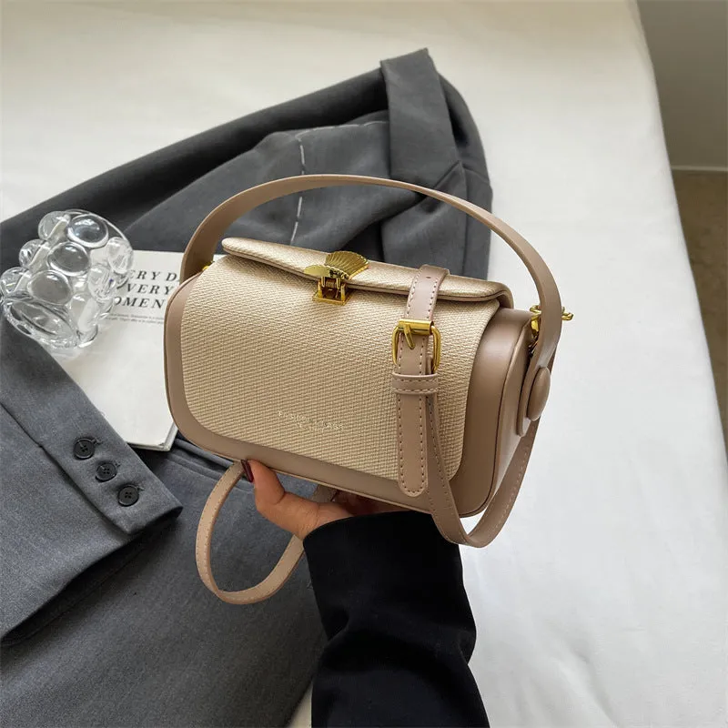 Women's PU leather messenger bag in horizontal square design with contrast stitching