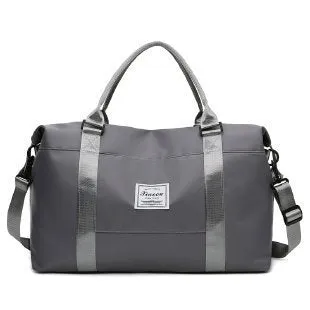Travel duffel bag in black with soft handle and zipper opening, 20-35L capacity for weekend trips and gym