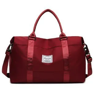 Travel duffel bag in black with soft handle and zipper opening, 20-35L capacity for weekend trips and gym