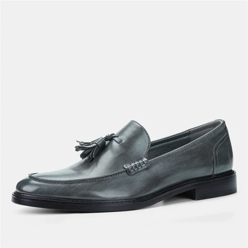 Men's brown formal leather loafers with tassels, PU upper, composite sole, low-cut round toe design on a clean background
