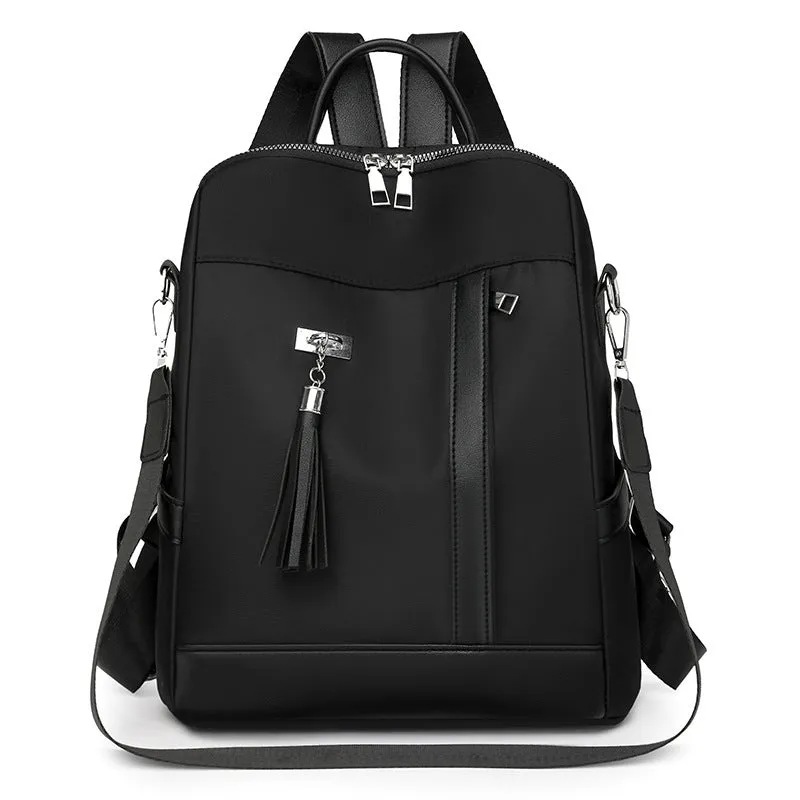 Soft black PU backpack with large main compartment and front organisational pockets