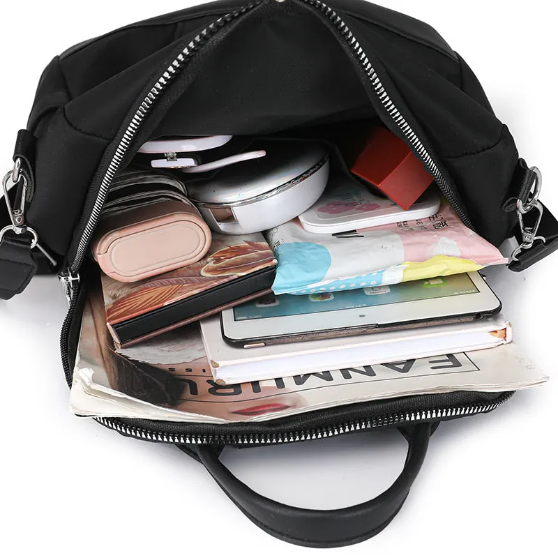 Soft black PU backpack with large main compartment and front organisational pockets