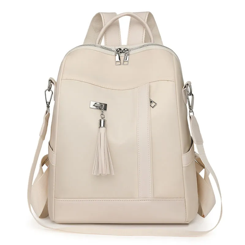 Soft black PU backpack with large main compartment and front organisational pockets