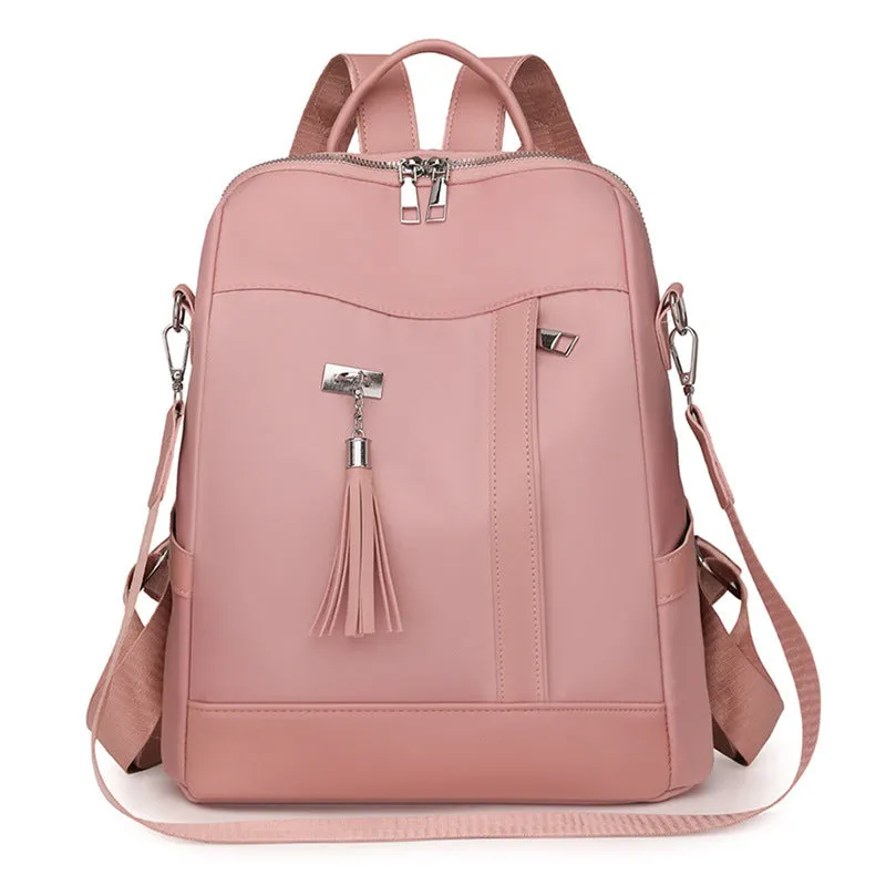 Soft black PU backpack with large main compartment and front organisational pockets