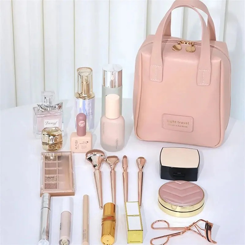 Shell shape PU leather waterproof cosmetic bag in milk apricot white with metal zipper