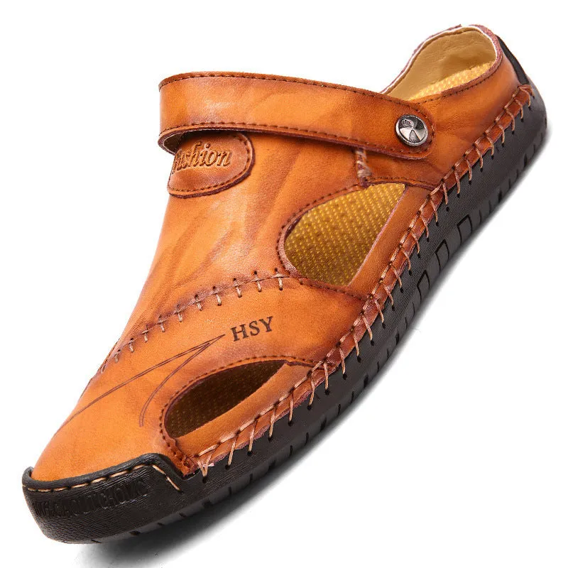 Men's closed toe sandals in black with rubber sole and adjustable slide strap