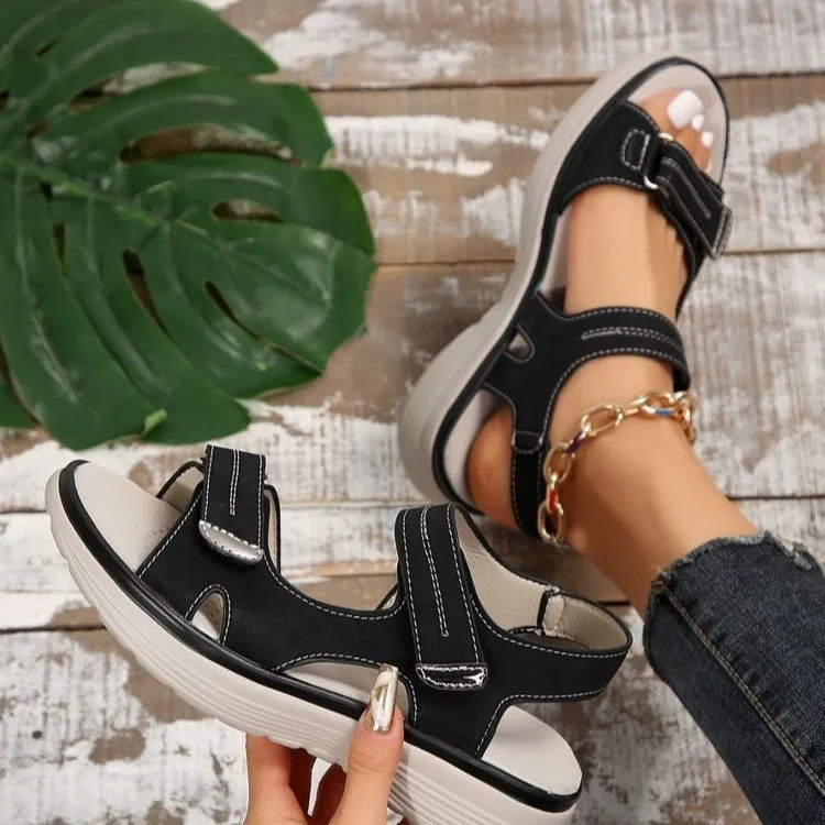 Casual Velcro-design sandals for women with fish mouth toe, hollow PU upper, and rubber sole in black colour