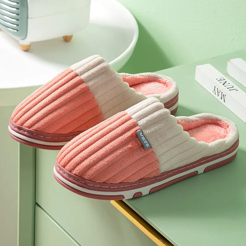 Unisex winter slippers in candy colour, suede upper, TPR sole, Baotou style, on a clean background.