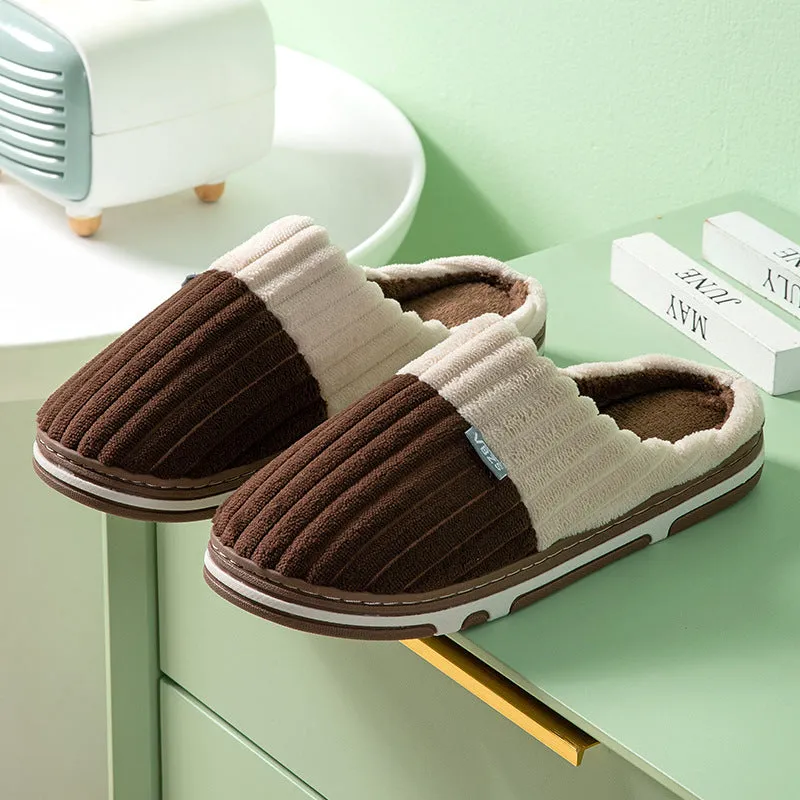 Unisex winter slippers in candy colour, suede upper, TPR sole, Baotou style, on a clean background.