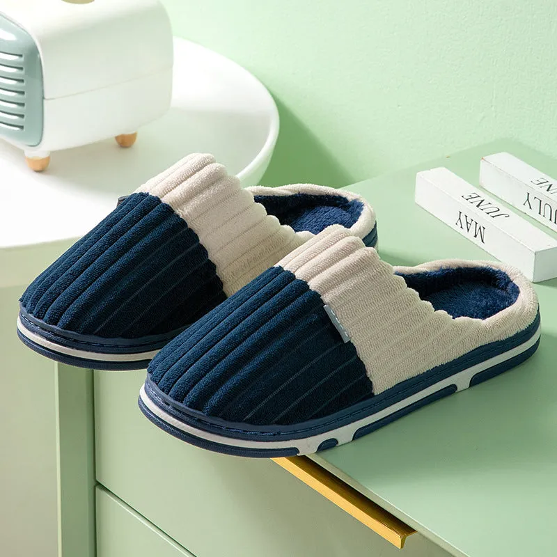 Unisex winter slippers in candy colour, suede upper, TPR sole, Baotou style, on a clean background.