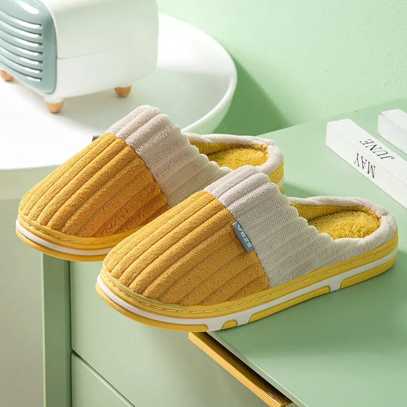 Unisex winter slippers in candy colour, suede upper, TPR sole, Baotou style, on a clean background.