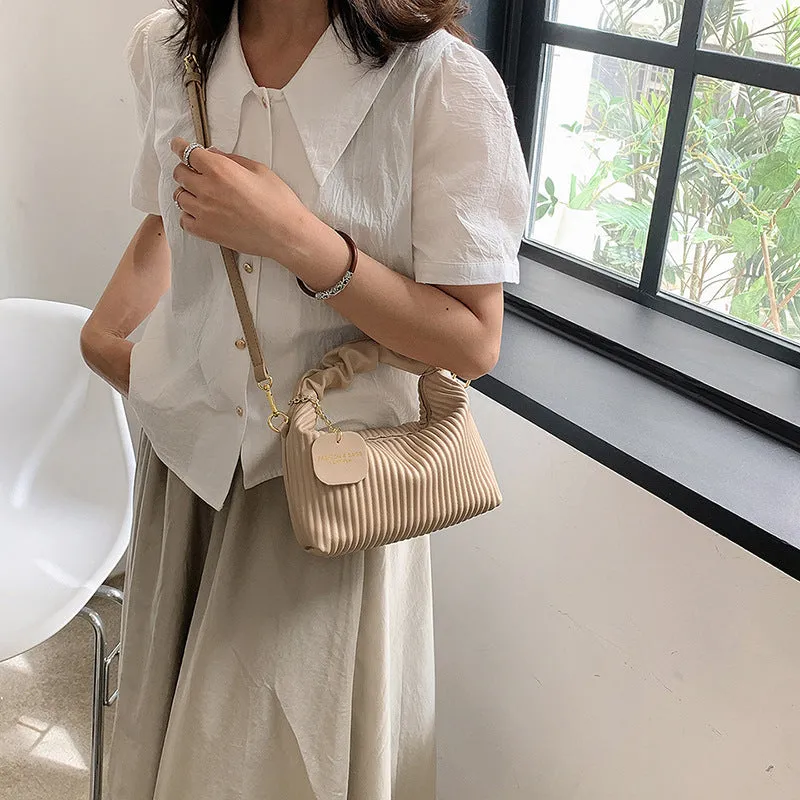 Women's PU leather pleated cloud crossbody bag in black front view