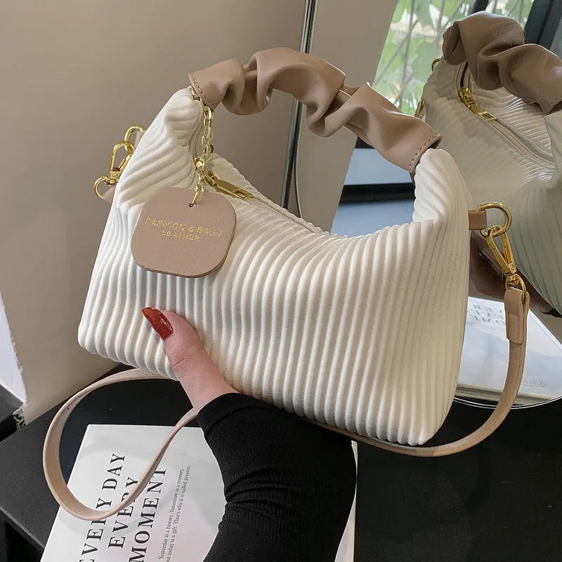 Women's PU leather pleated cloud crossbody bag in black front view