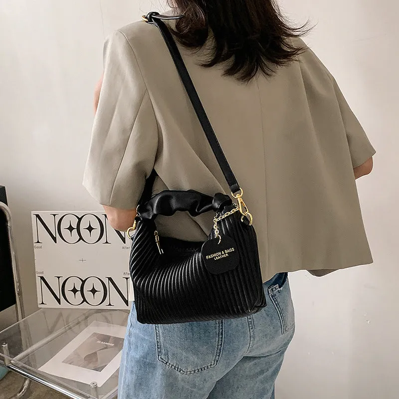 Women's PU leather pleated cloud crossbody bag in black front view