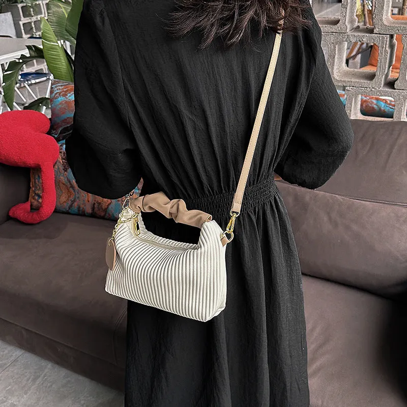 Women's PU leather pleated cloud crossbody bag in black front view