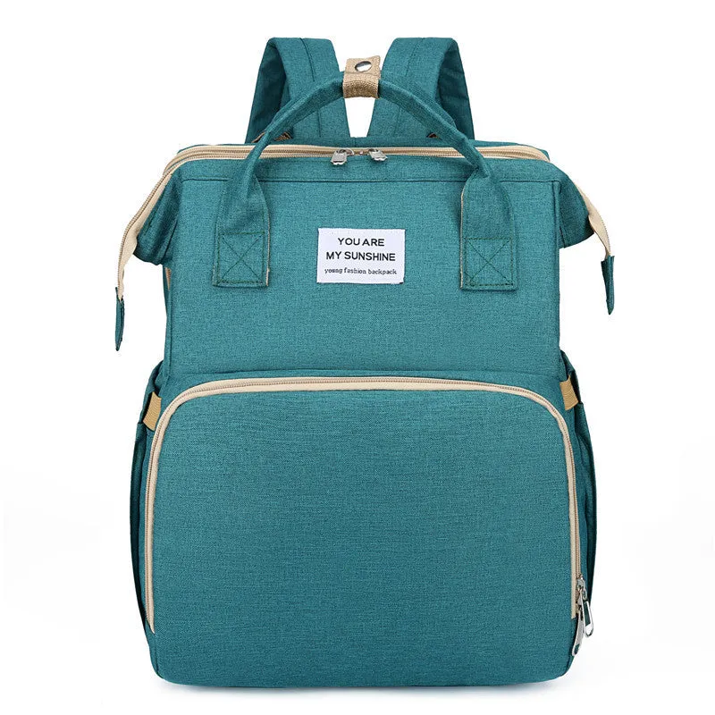 Portable folding crib mummy bag in nylon with USB interface and curved shoulder strap