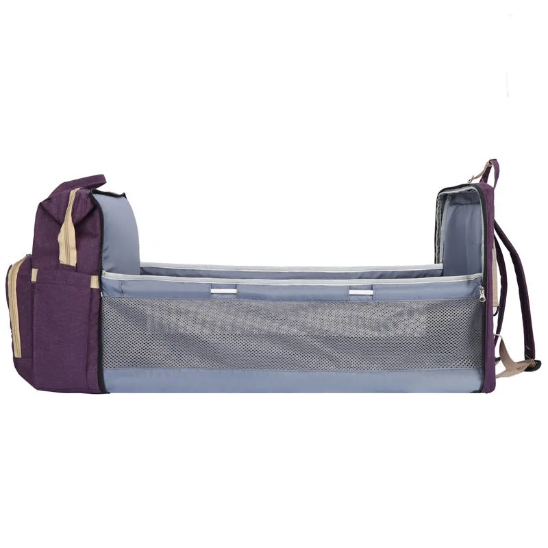 Portable folding crib mummy bag in nylon with USB interface and curved shoulder strap