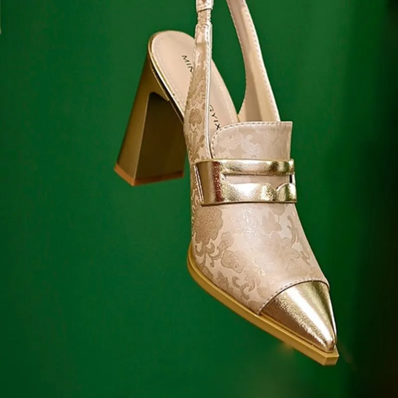 Women's black high-heel sandals with chunky heel, pointed toe, and elastic strap fastening
