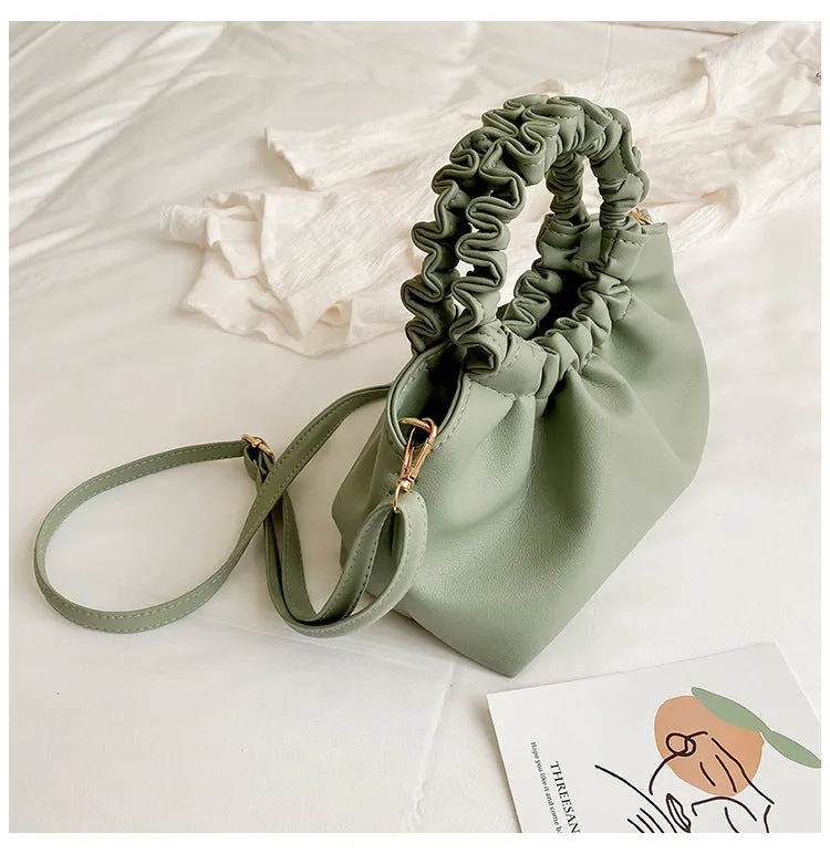 Medium one-shoulder bucket messenger bag in soft PU with fold detail and internal phone pocket