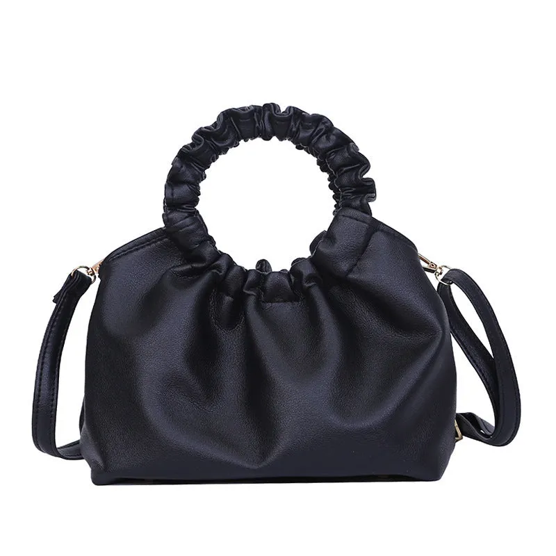Medium one-shoulder bucket messenger bag in soft PU with fold detail and internal phone pocket