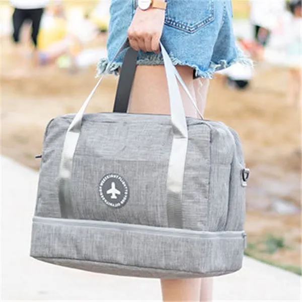 Dry and wet separation travel bag in purple made of waterproof cationic Oxford cloth, showing cube shape with double chambers