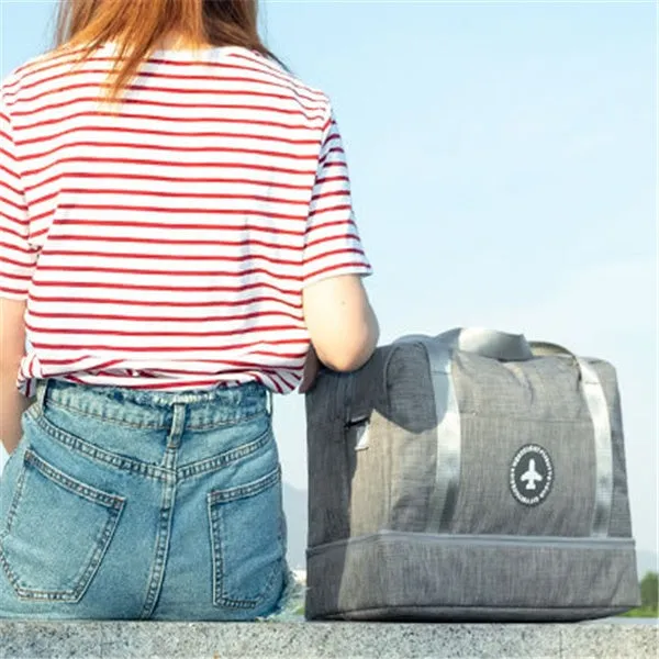 Dry and wet separation travel bag in purple made of waterproof cationic Oxford cloth, showing cube shape with double chambers