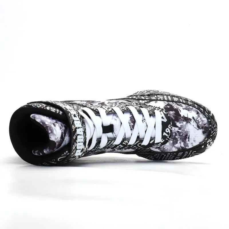 Men's high-top boxing shoes with graffiti style, black colour, front lace-up closure, mesh upper, and rubber outsole on a flat surface.