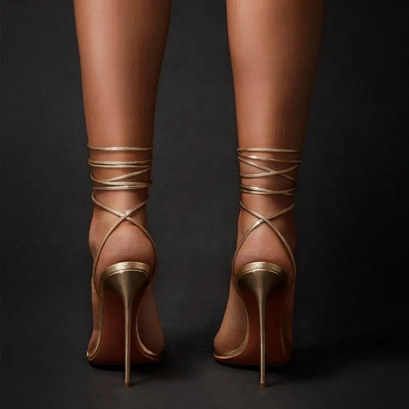 Gold women's ankle strap stiletto sandals with pointed toe and side air detail