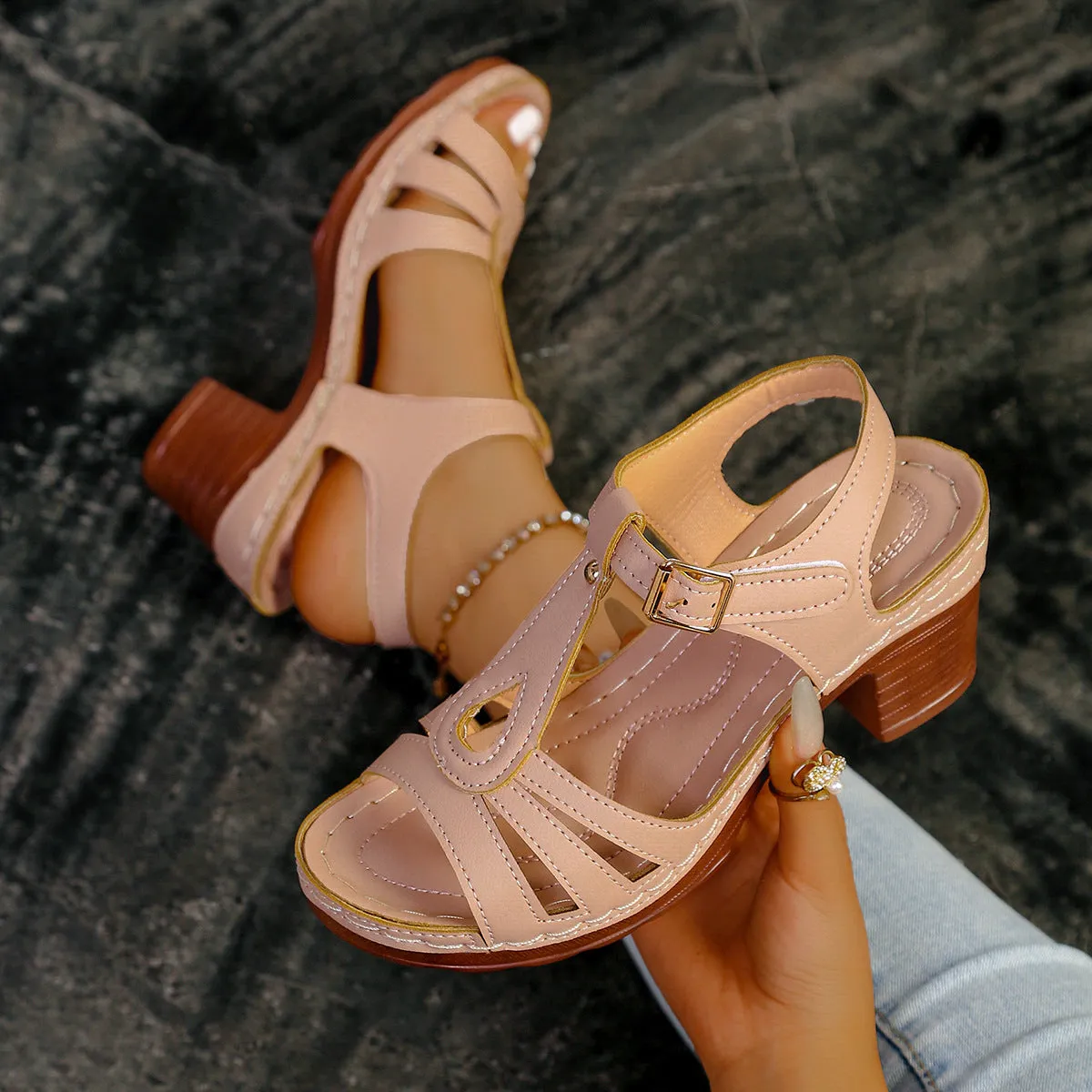 Women's black peep toe wedge platform sandals with an adjustable buckle strap on a white background.