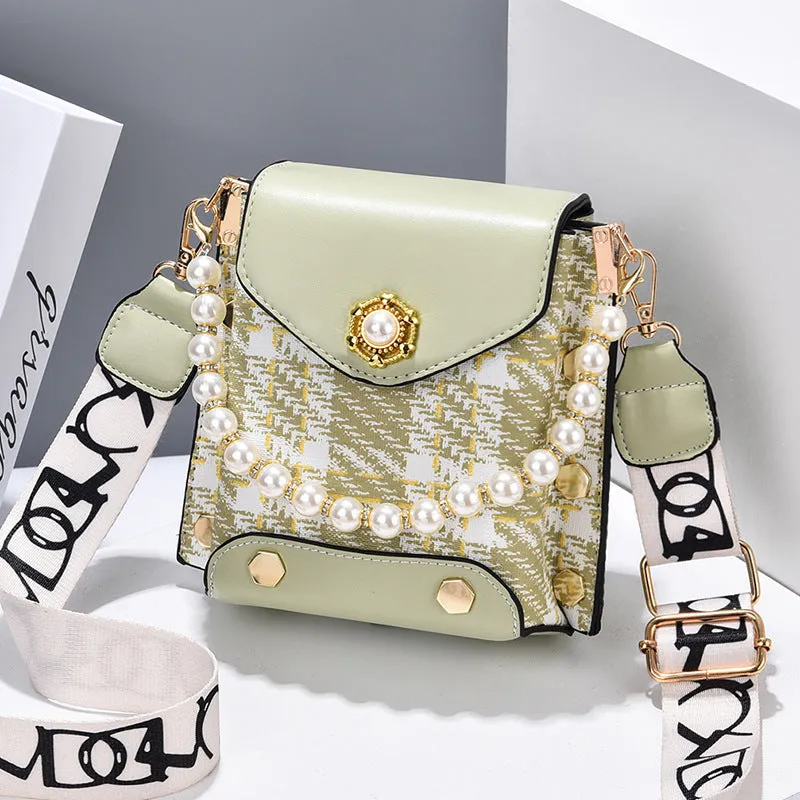 Women's crossbody phone bag in PU leather with pearl pendant and gold metal studs, magnetic flap closure