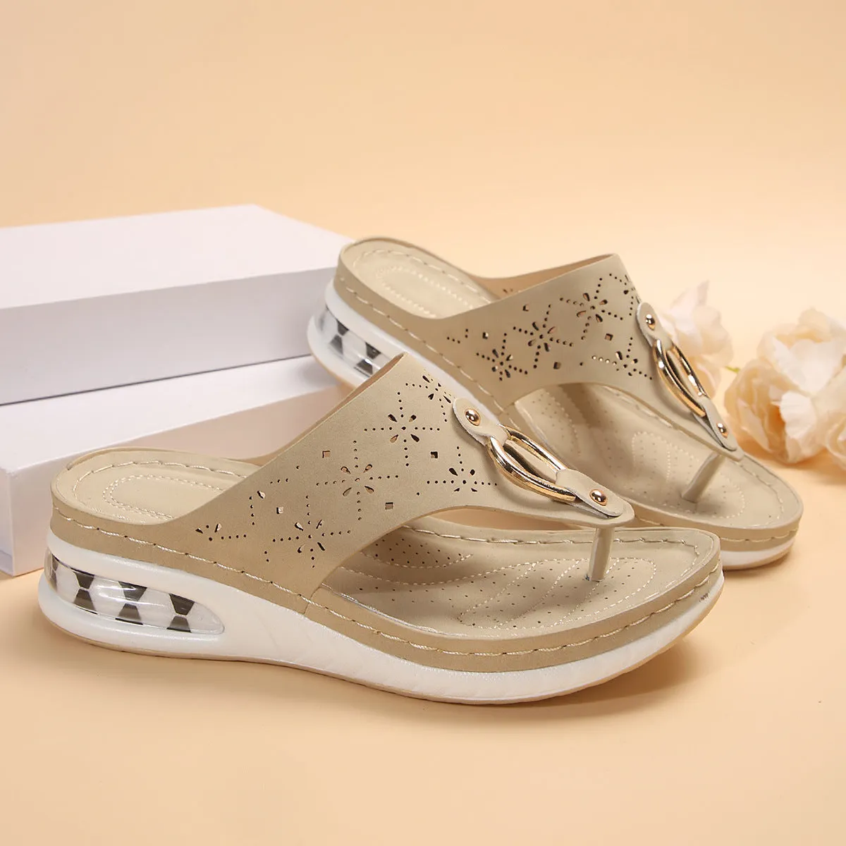 Women's air cushion wedge thong sandals with hollow metal buckle, black PU upper, rubber sole, herringbone toe