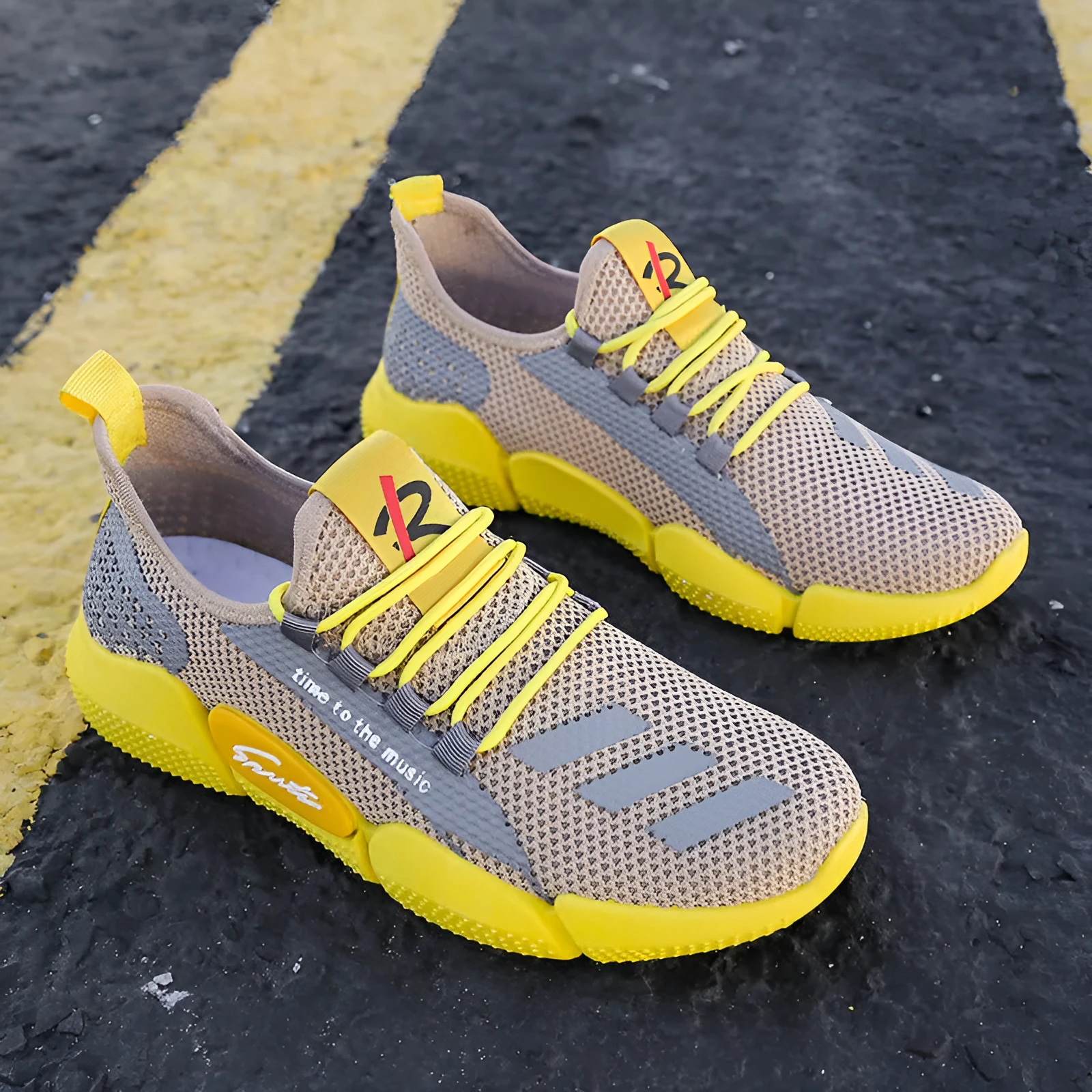 Men's casual canvas shoes low top round toe Korean net style in yellow colour on white background