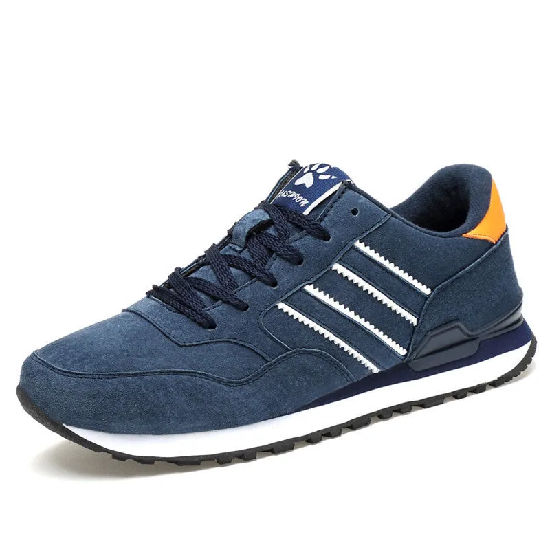 Blue leather sneakers for men with low-top design, pigskin upper, and rubber sole on a plain background