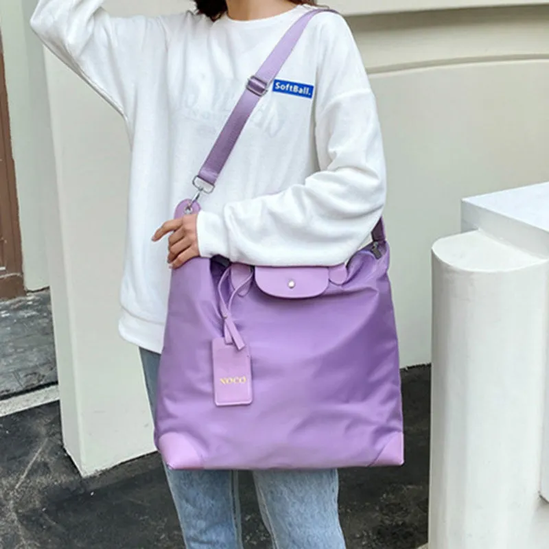 Oxford cloth medium travel bag with lock closure and embroidery, available in multiple colours